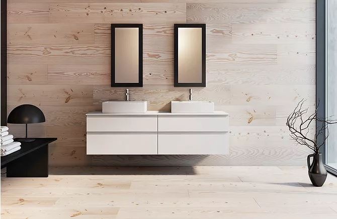 Badeværelse med væghængt toilet udført af Hansen & Berg
